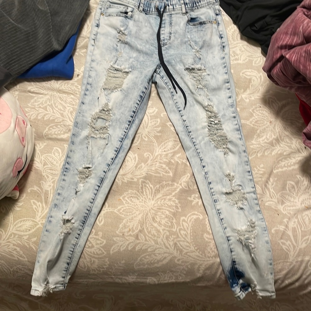 Blue washed jeans skinny ripped 10 dollars original price is 30.00